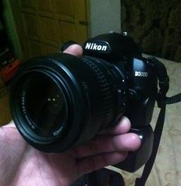 DSLR Nikon D3000 with nissin flash and battgrip photo